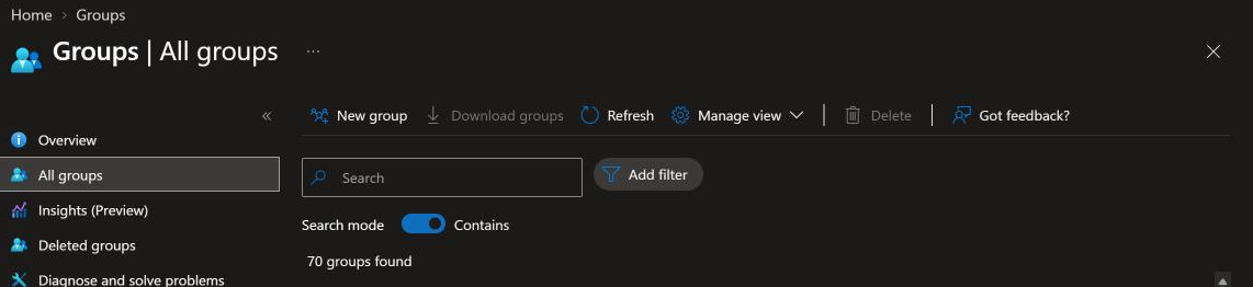 The Entra admin center All groups blade with the Download groups control on the toolbar beside New group